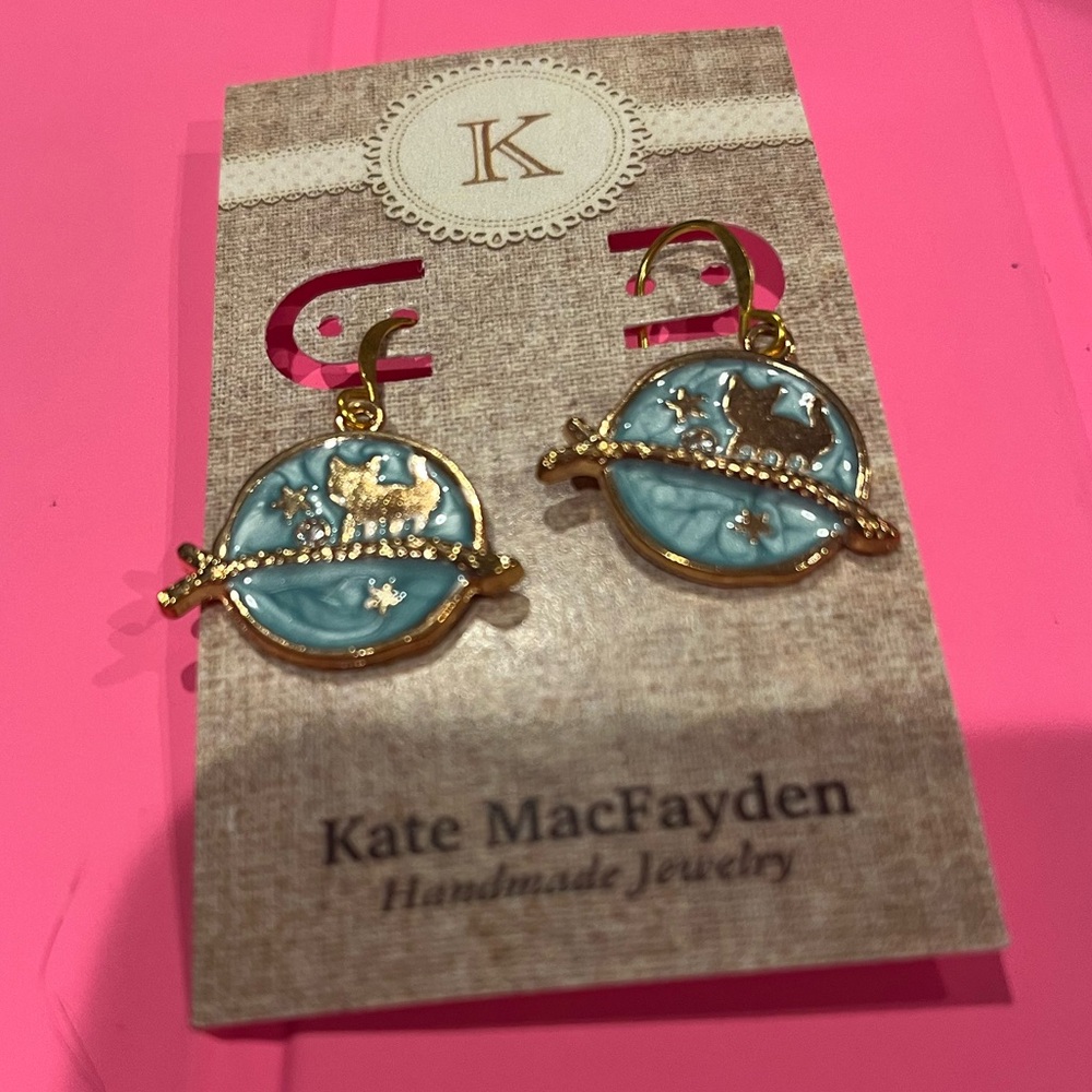cat earrings.